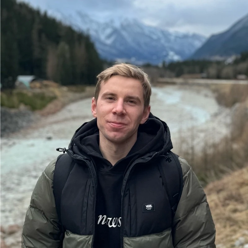 Illia Haidar outdoors in the mountains